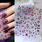 Pink and black 5D leopard print nail art stickers by Blushimmer on a transparent sheet for DIY manicure decoration.