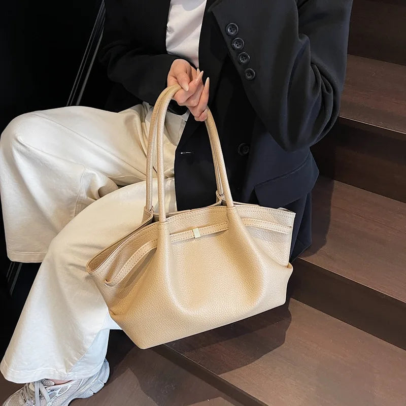 Luxury soft PU leather tote bag by Worldfone Direct Store, spacious women's shoulder and crossbody bag for commuting and travel.