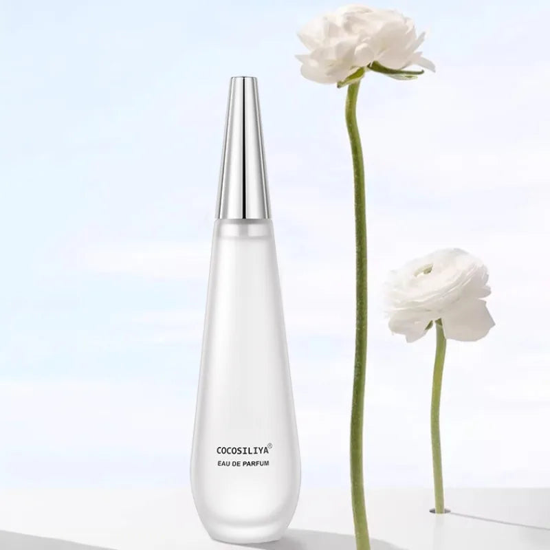 Elegant 100ml women’s floral eau de parfum by Blushimmer featuring lotus, rose, peony, amber, musk, and woody scent notes.