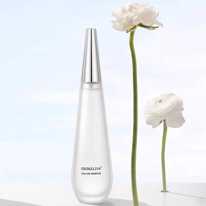 Elegant 100ml women’s floral eau de parfum by Blushimmer featuring lotus, rose, peony, amber, musk, and woody scent notes.