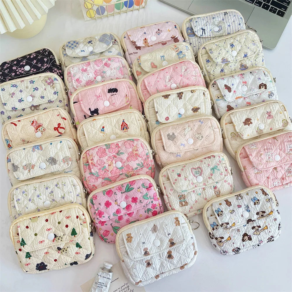 Blushimmer cute cartoon small travel makeup bag with lipstick, earphone, and card storage compartments for women.