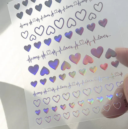 Colorful Cat's Eye 5D gradient European love heart gem nail art stickers with geometric wings for manicure decoration.