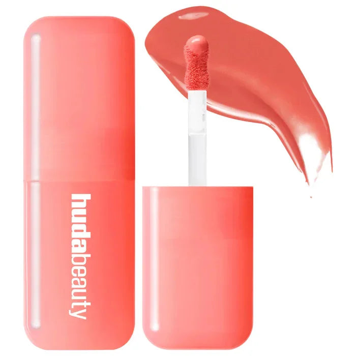Blushimmer Huda Beauty Blush Filter Soft Glow liquid blush with shiny lip gloss in cotton candy bubblegum shades, featuring a smooth, glossy finish.