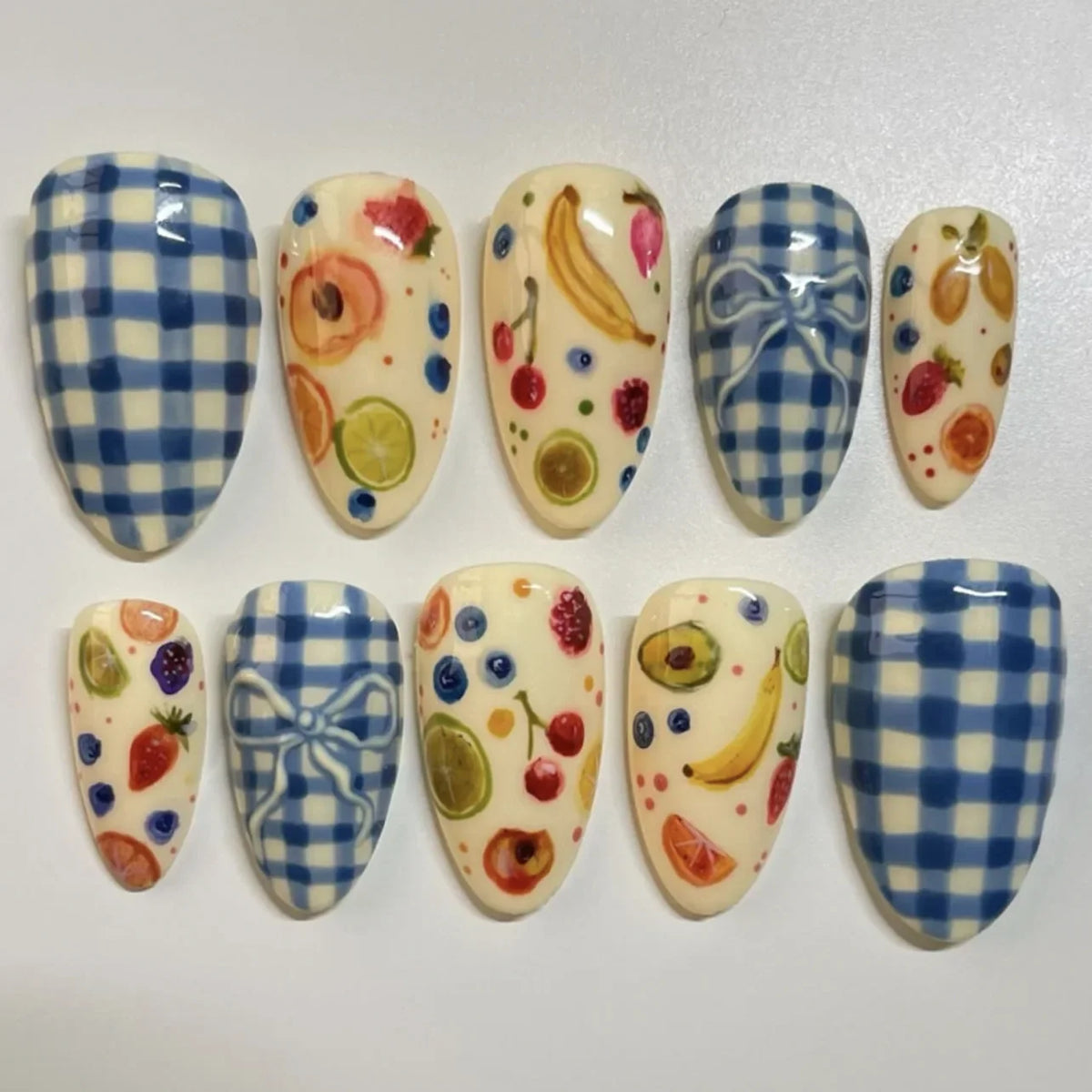 Blushimmer 24-piece wine red almond press-on nails with cartoon rabbit, bowknot, plaid, pearl designs, French style for girls.