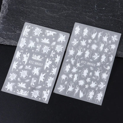 Blushimmer 3D white flower nail art stickers with cute floral designs, adhesive acrylic nail decals for DIY nail decoration.