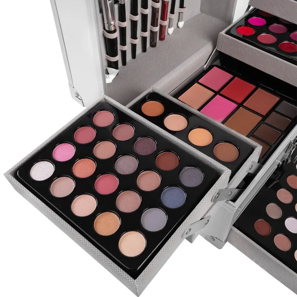 Blushimmer makeup gift set with face powder, eyeshadow palette, lipstick, brushes, highlighter, and bronzer in a full beauty kit