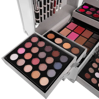 Blushimmer makeup gift set with face powder, eyeshadow palette, lipstick, brushes, highlighter, and bronzer in a full beauty kit