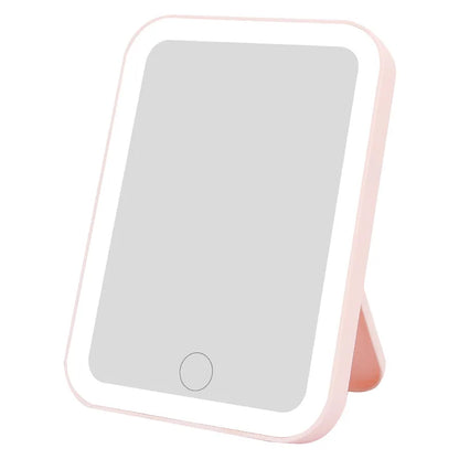 Blushimmer 3-color LED vanity mirror with touch screen, USB rechargeable, dimmable brightness, portable makeup mirror.