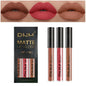 Set of three waterproof liquid lipsticks in red, blue, and purple matte shades with nude lip tint from Blushimmer.