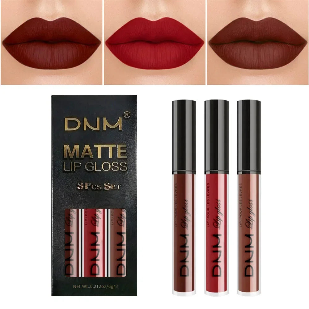 Set of four liquid lipsticks in black, blue, purple, and green with matte finish from Blushimmer, displayed in their containers.