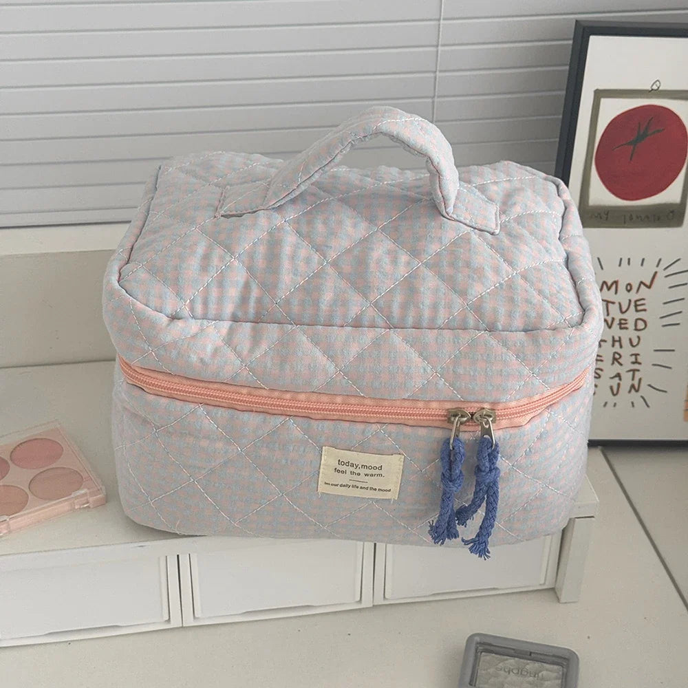 Pink Blushimmer Airfriend makeup bag with soft fabric, featuring a cute cosmetic and toiletry organizer for women's travel essentials.
