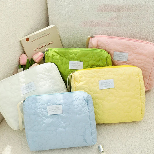 Large waterproof cosmetic bag by Blushimmer with embroidery, portable travel storage for makeup and beauty essentials.