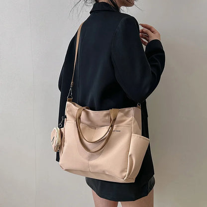 LPO women's khaki Oxford tote crossbody shoulder handbag with adjustable strap and spacious interior for everyday use.