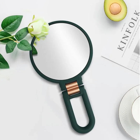 Blushimmer 2x to 15x magnifying makeup pocket mirror, foldable compact with small reflective surface for women.