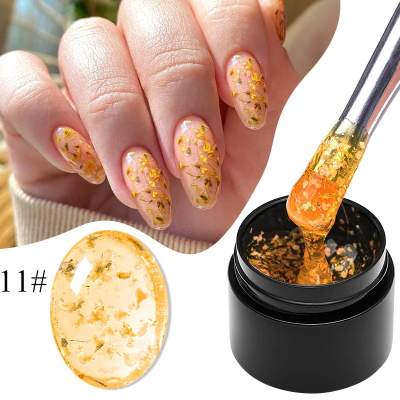 Pink dried flower gel nail polish by Blushimmer with natural flower accents, UV and LED soak-off gel for nail art and fairy nail designs