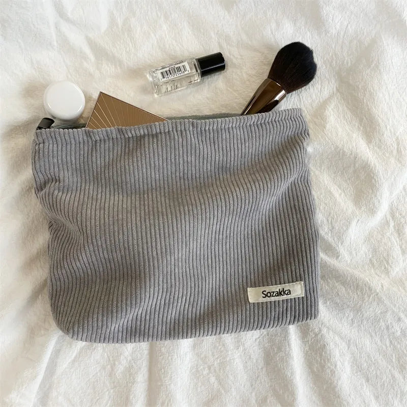 Blushimmer corduroy makeup bag for women with large capacity for lipstick, change, mobile phone, and essentials, handheld design.