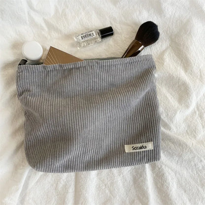 Blushimmer corduroy makeup bag for women with large capacity for lipstick, change, mobile phone, and essentials, handheld design.