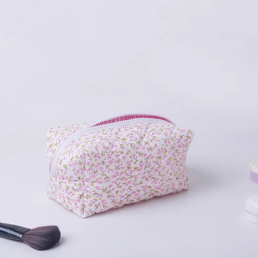Blushimmer floral quilted makeup bag with puffy design, large travel cosmetic pouch for storing makeup and accessories.