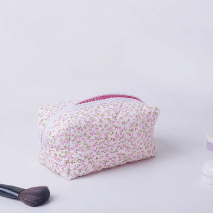 Blushimmer floral quilted makeup bag with puffy design, large travel cosmetic pouch for storing makeup and accessories.