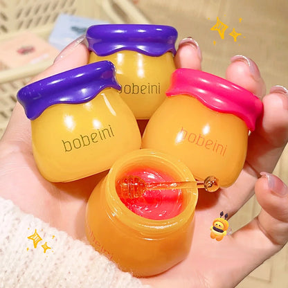 Blushimmer Hydrating Peach & Honey Lip Mask showing a jar of nourishing lip moisturizer for dry lips and fine line reduction.