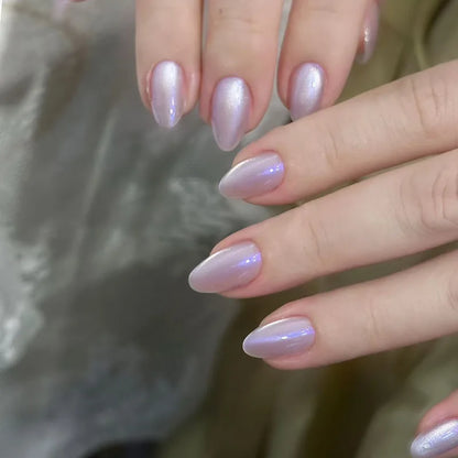 24pcs glossy red cat's eye press-on nails by Blushimmer, almond-shaped false nails with a nude color, full cover, and charms.