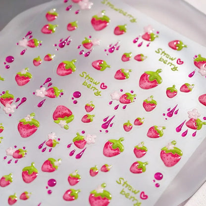 Red cherry-shaped nail art stickers with shiny crystals and bowknot designs for DIY manicure decoration by Blushimmer.