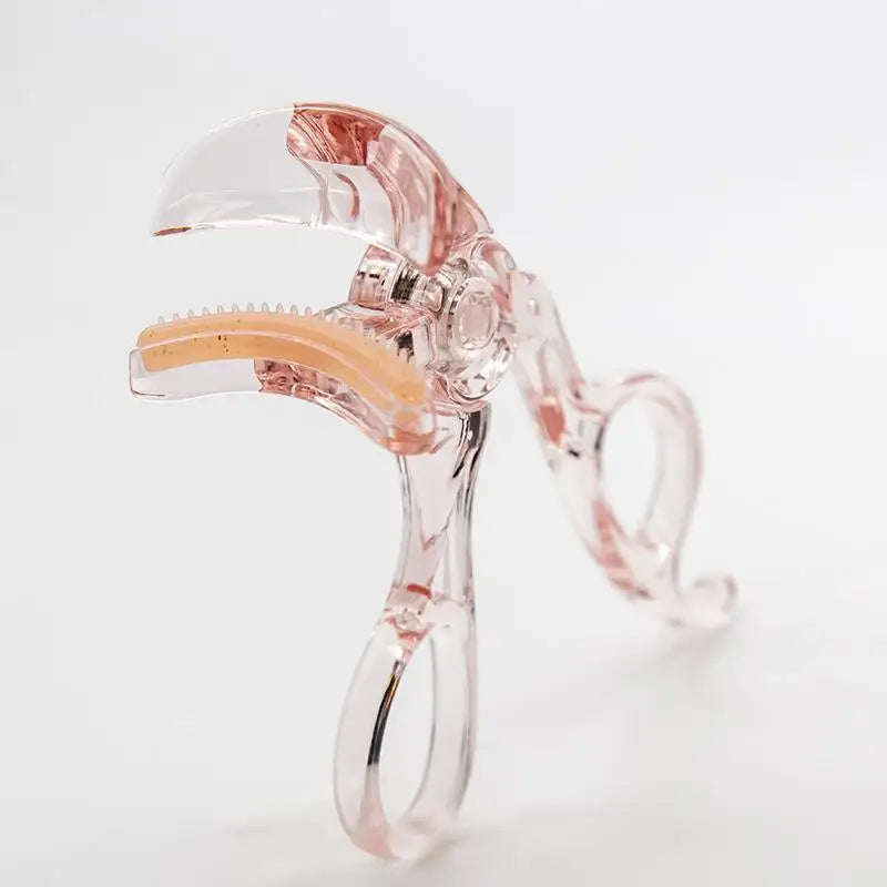 Blushimmer frameless eyelash curler with wide-angle clip and toothed comb for professional, portable eyelash curling.