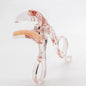 Blushimmer frameless eyelash curler with wide-angle clip and toothed comb for professional, portable eyelash curling.