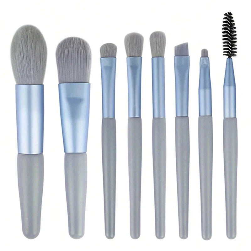Set of 13 Blushimmer makeup brushes including eye shadow, foundation, blush, and cosmetic tools in a soft makeup bag.