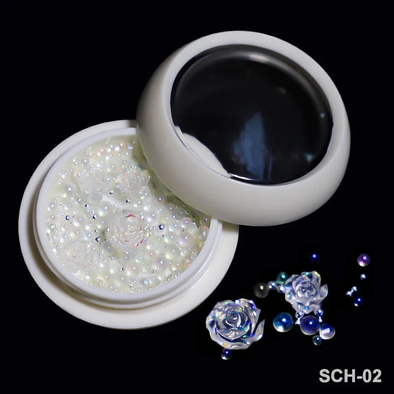 White acrylic flower nail art decorations with mixed size rhinestones and colorful gems for DIY manicure designs.