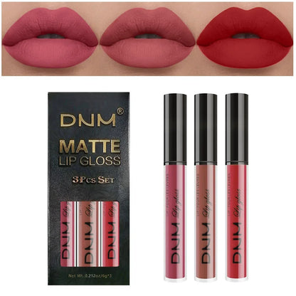 Set of three waterproof liquid lipsticks by Blushimmer in red, blue, purple, and nude shades with matte finish.