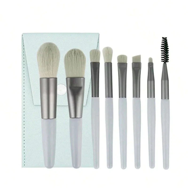 Blushimmer 13-piece makeup brush set with eyeshadow, foundation, blush, and cosmetic brushes in a soft makeup tools bag.