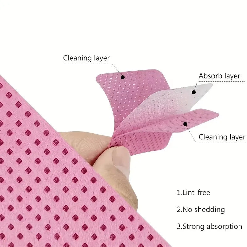 Set of 50 lint-free nail wipes in white and pink, super absorbent for gel polish removal, eyelash extensions, and nail prep.