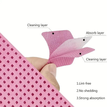 Set of 50 lint-free nail wipes in white and pink, super absorbent for gel polish removal, eyelash extensions, and nail prep.