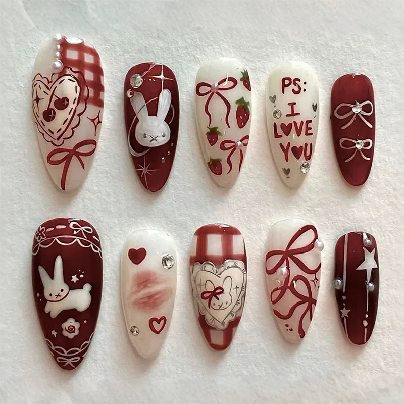 Blushimmer 24-pack wine red almond press-on nails with cartoon rabbit, bowknot, plaid, pearl accents, French style for girls.