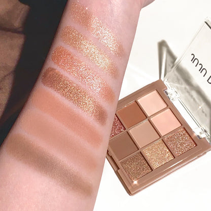 Blushimmer 9-18 color eyeshadow palette with velvet matte and shimmer finishes in berry, brown, and nude tones.