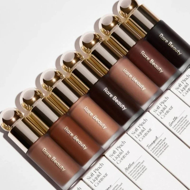 Blushimmer Rare Beauty 3D Face Contour Liquid Bronzer in shade with mirror, showcasing smooth, natural nose shadow and brightening makeup effect.