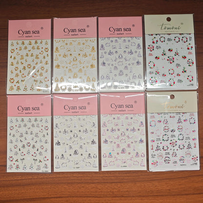 Silver snowflake nail stickers by Blushimmer featuring self-adhesive Christmas tree and winter-themed nail art decals.