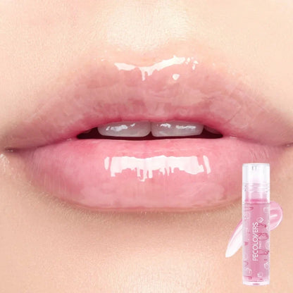 Blushimmer moisturizing water lip gloss with transparent mirror crystal jelly texture and plumping lip oil for shiny lip care.