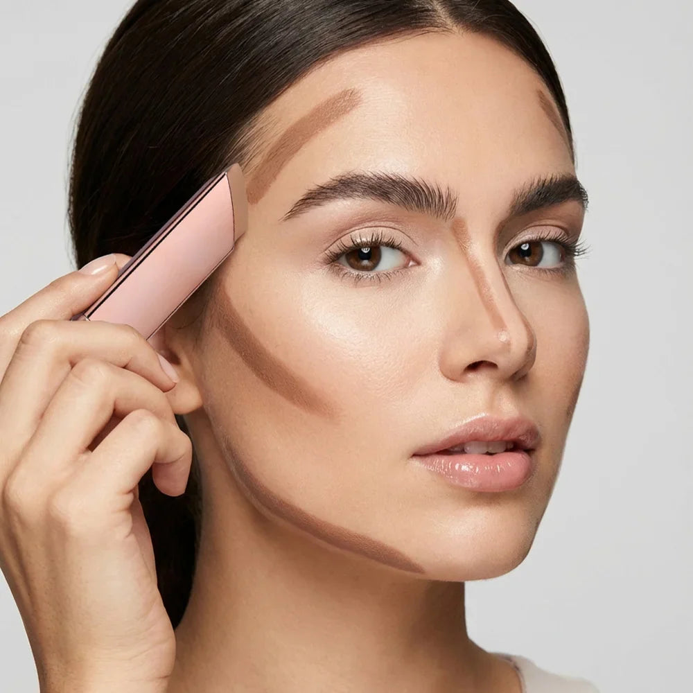 Blushimmer 2-in-1 cream bronzer and contour stick for face sculpting, showcasing the sleek, portable product with warm and cool shades