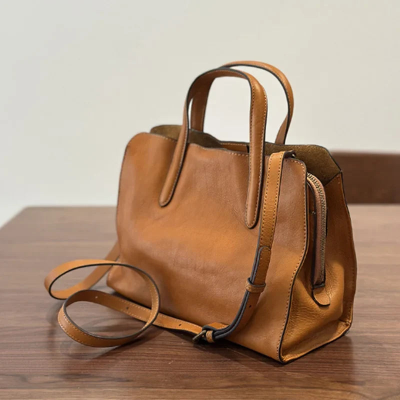 Women's genuine leather crossbody tote bag by NNEOBA, featuring a stylish design and spacious interior for everyday use.