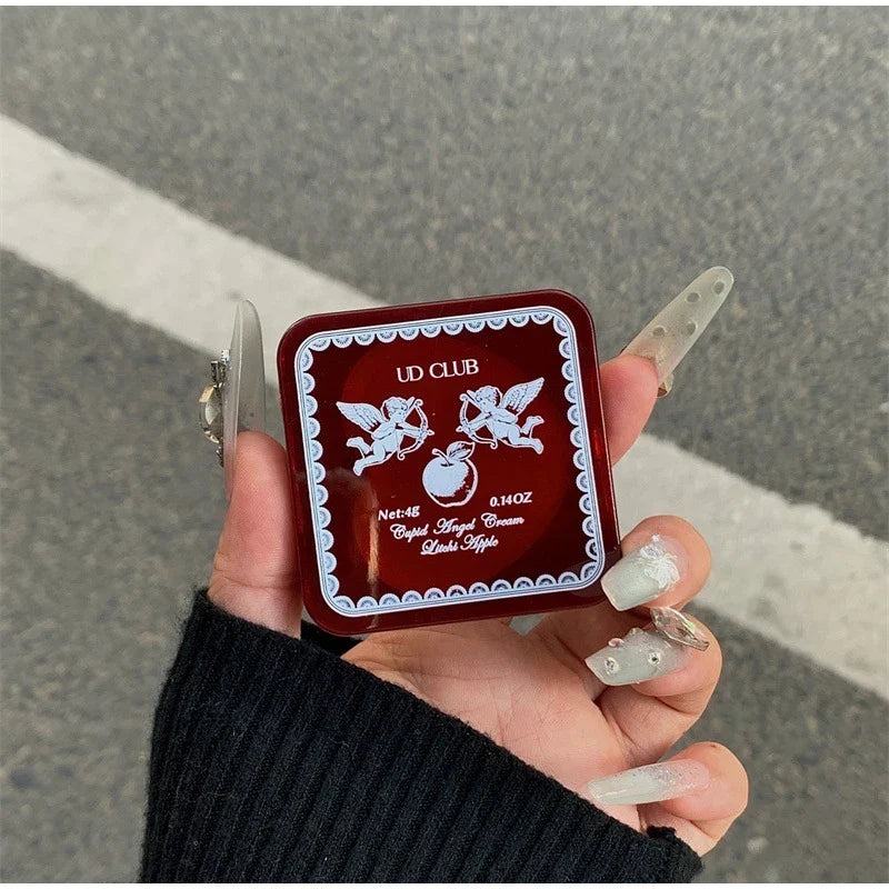 Blushimmer Cupid perfume bottle featuring a long-lasting floral fruity fragrance with strawberry, gardenia, and apple notes.