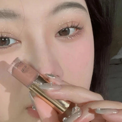 Blushimmer liquid eyeshadow stick with matte and glitter shades, showcasing blendable, creamy texture for natural eye makeup.
