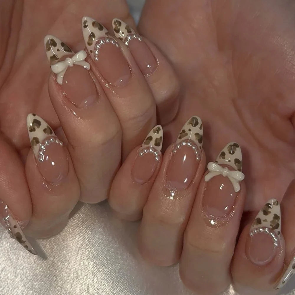 Blushimmer 3D bowknot pearl leopard French nude almond fake nails, wearable and detachable press-on nail art design.