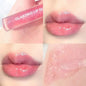 Blushimmer transparent water lip gloss in a clear glass container, showcasing a glossy, waterproof liquid lip glaze for lips.