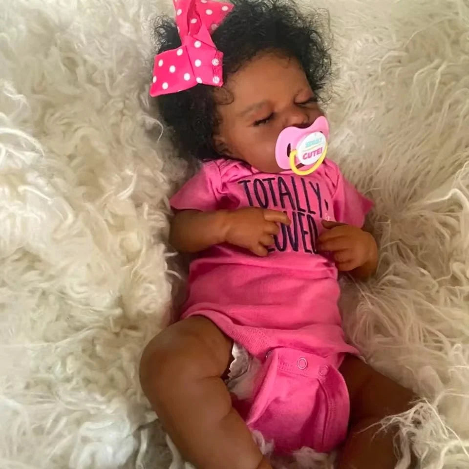 Risbecko 20-inch lifelike black reborn baby doll with soft cloth body, realistic African American baby doll for gifting or display