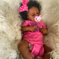 Risbecko 20-inch lifelike black reborn baby doll with soft cloth body, realistic African American baby doll for gifting or display