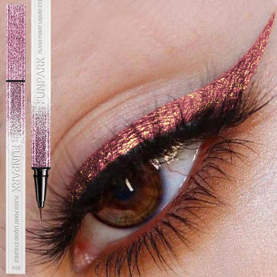 Shiny pearlescent metallic liquid eyeliner by Blushimmer, waterproof in a 0.6ml tube, with a sleek applicator brush visible.