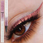Shiny pearlescent metallic liquid eyeliner by Blushimmer, waterproof in a 0.6ml tube, with a sleek applicator brush visible.