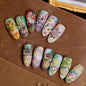 Set of 24 Blushimmer wine red almond press-on nails with cartoon rabbit, bowknot, plaid, pearl accents, and French tip designs.